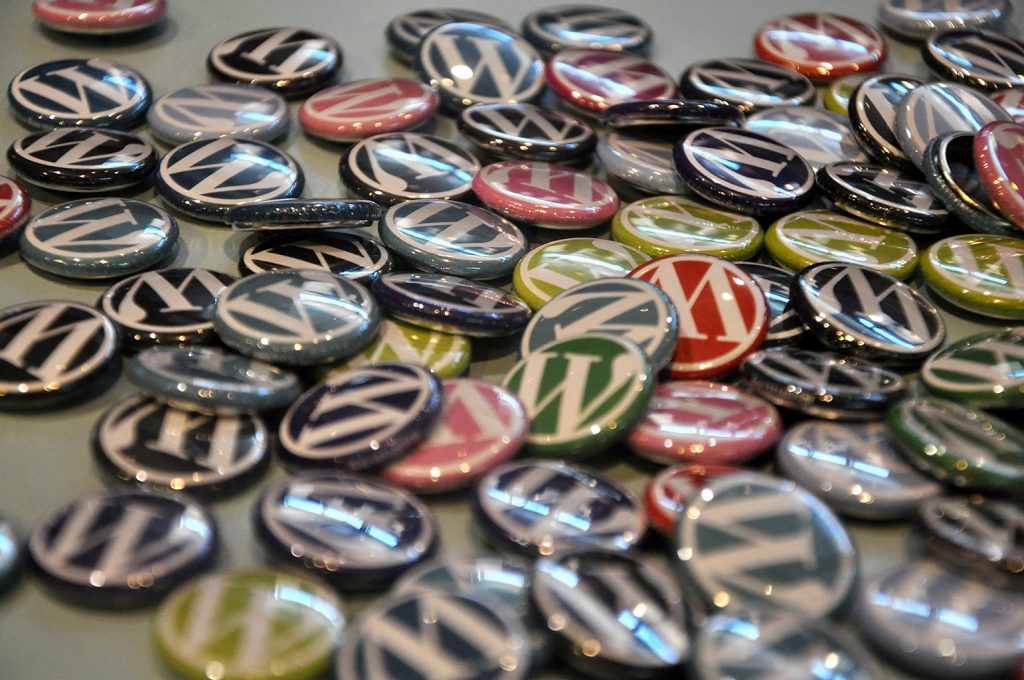 pins of WordPress logo in multiple colours